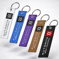 Llaveros bordados Autórita BJJ en colores blanco, azul, morado, marrón y negro con franja roja — Show Your Soul
